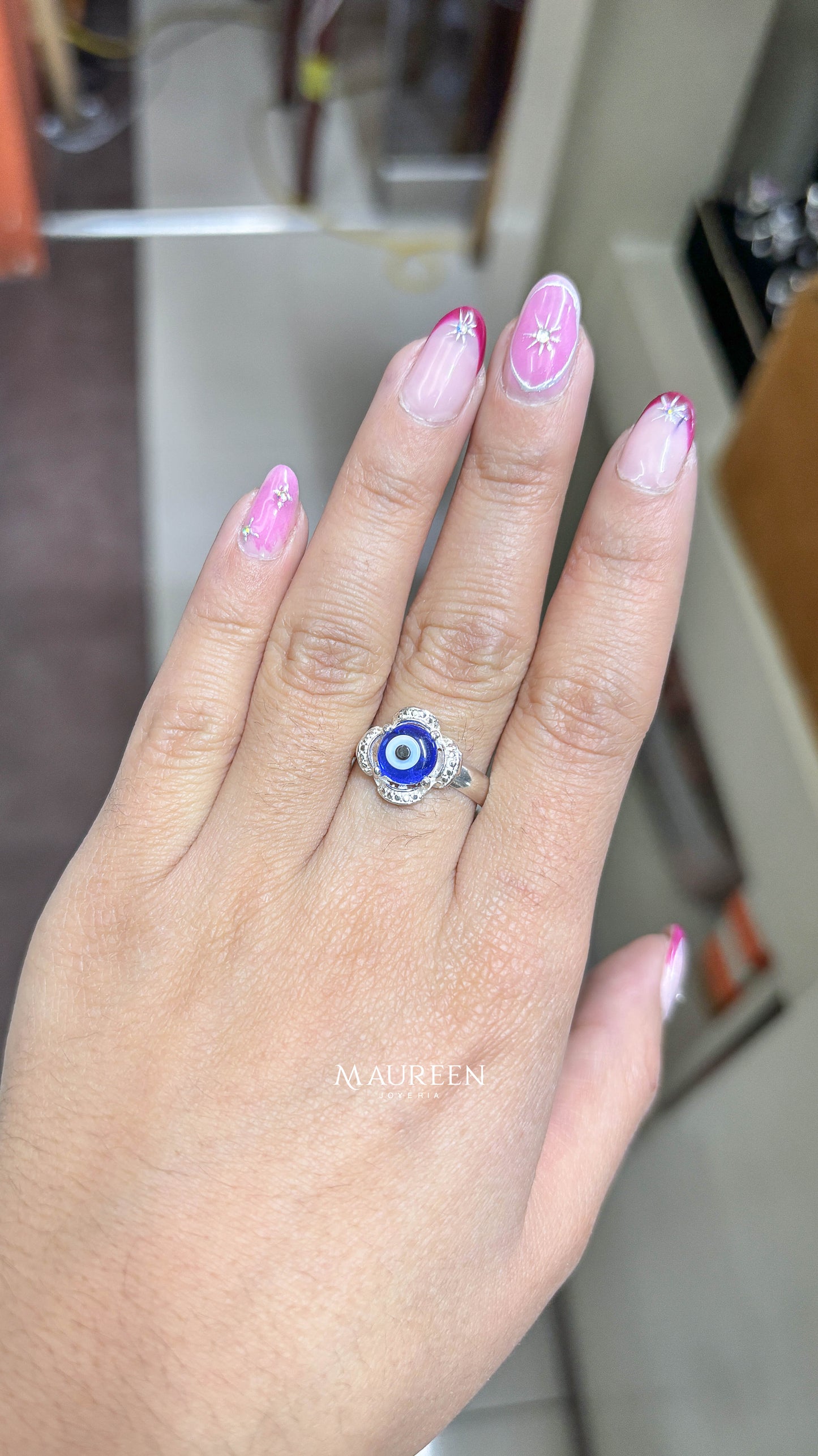 Anillo flor con ojo turco (rojo y azul)