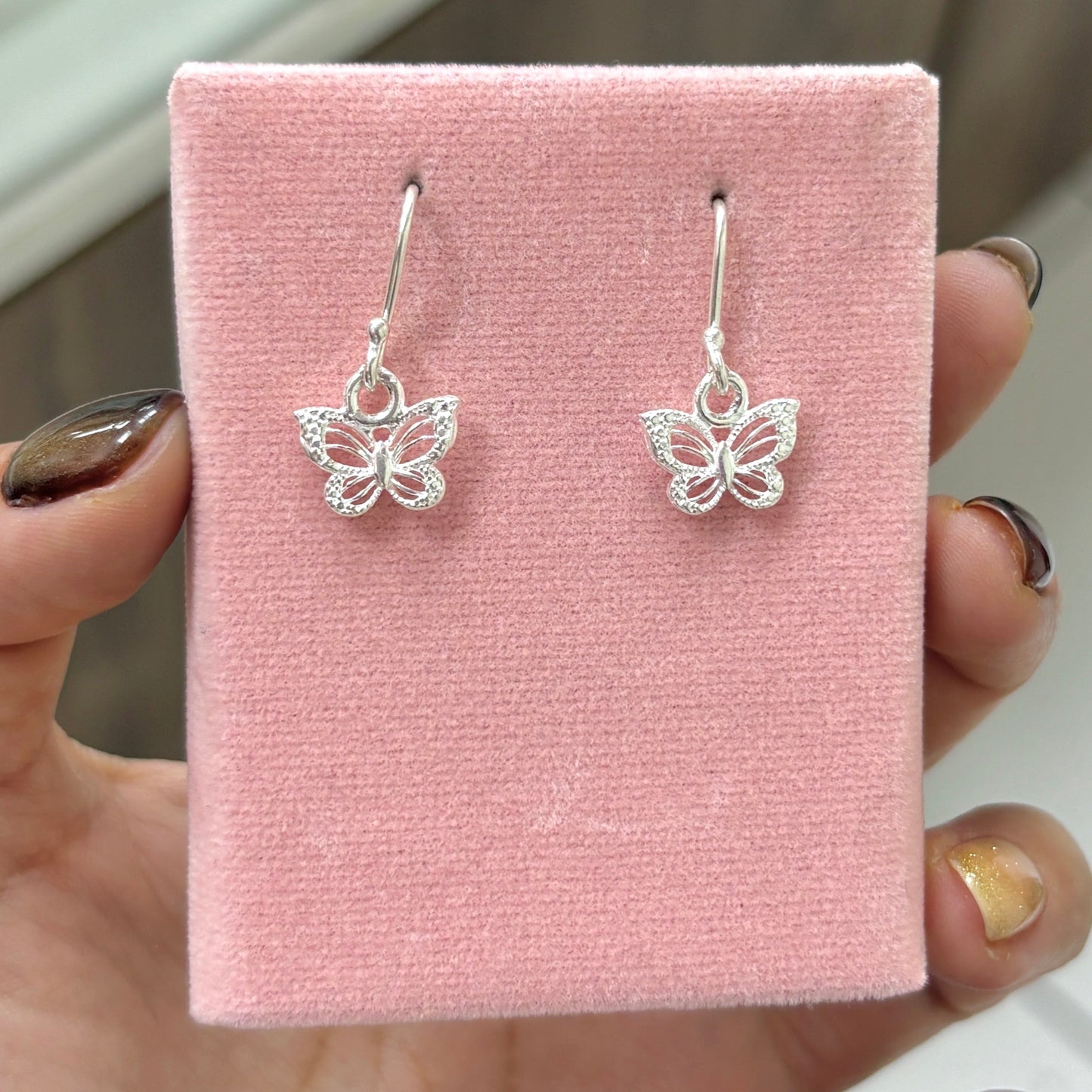 Arete mariposa colgante - plata