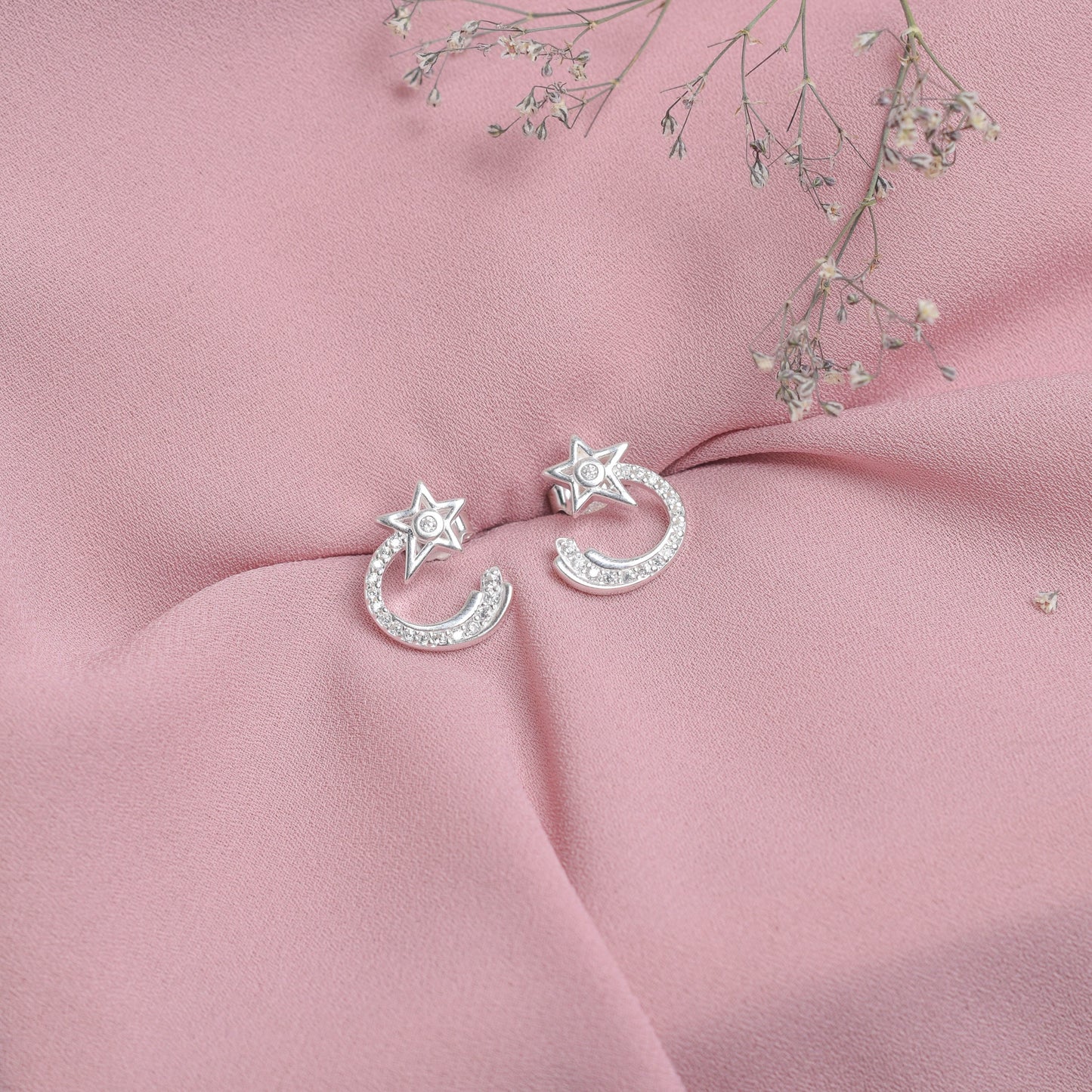 Arete estrella fugas con circones - Plata