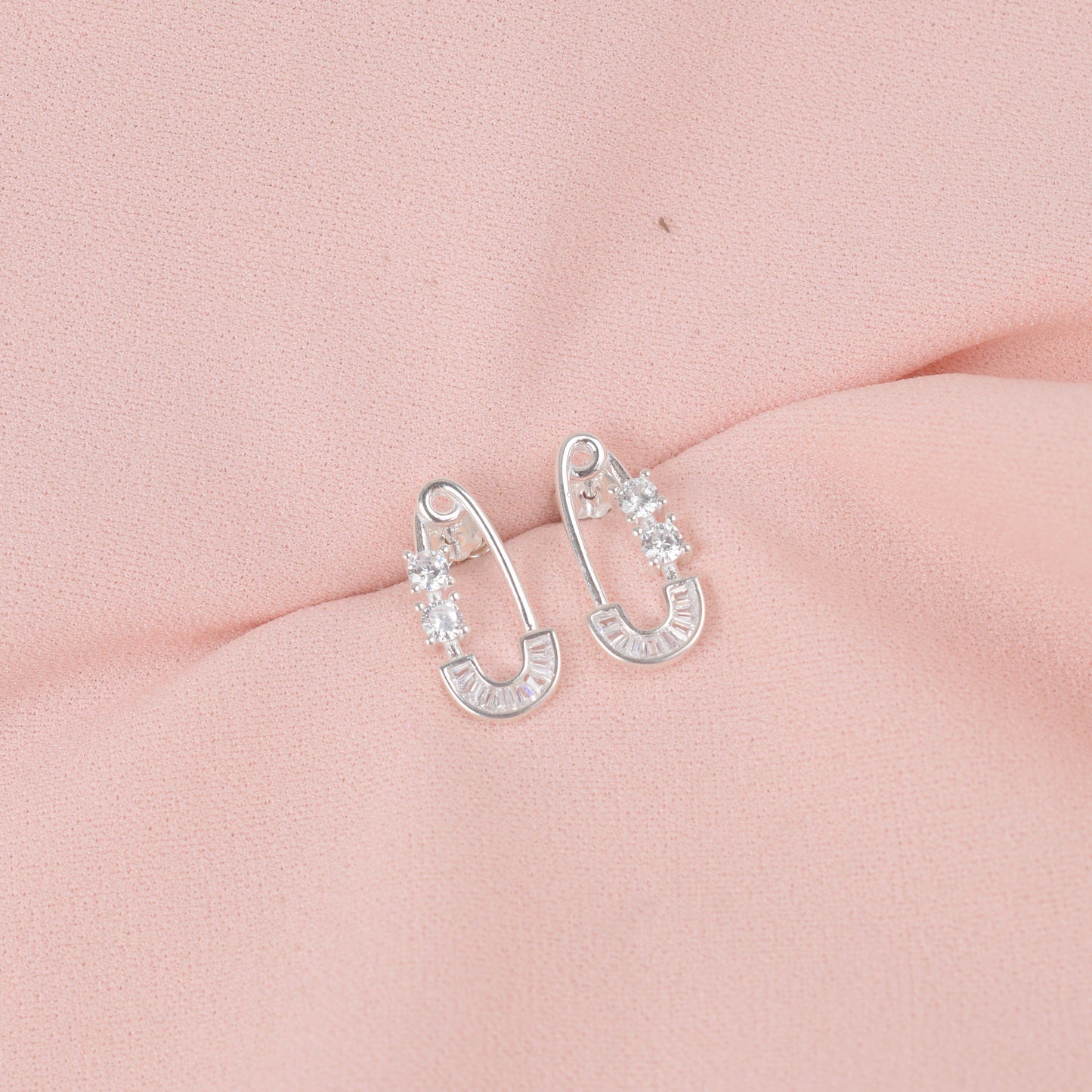 Arete clip con circones - Plata