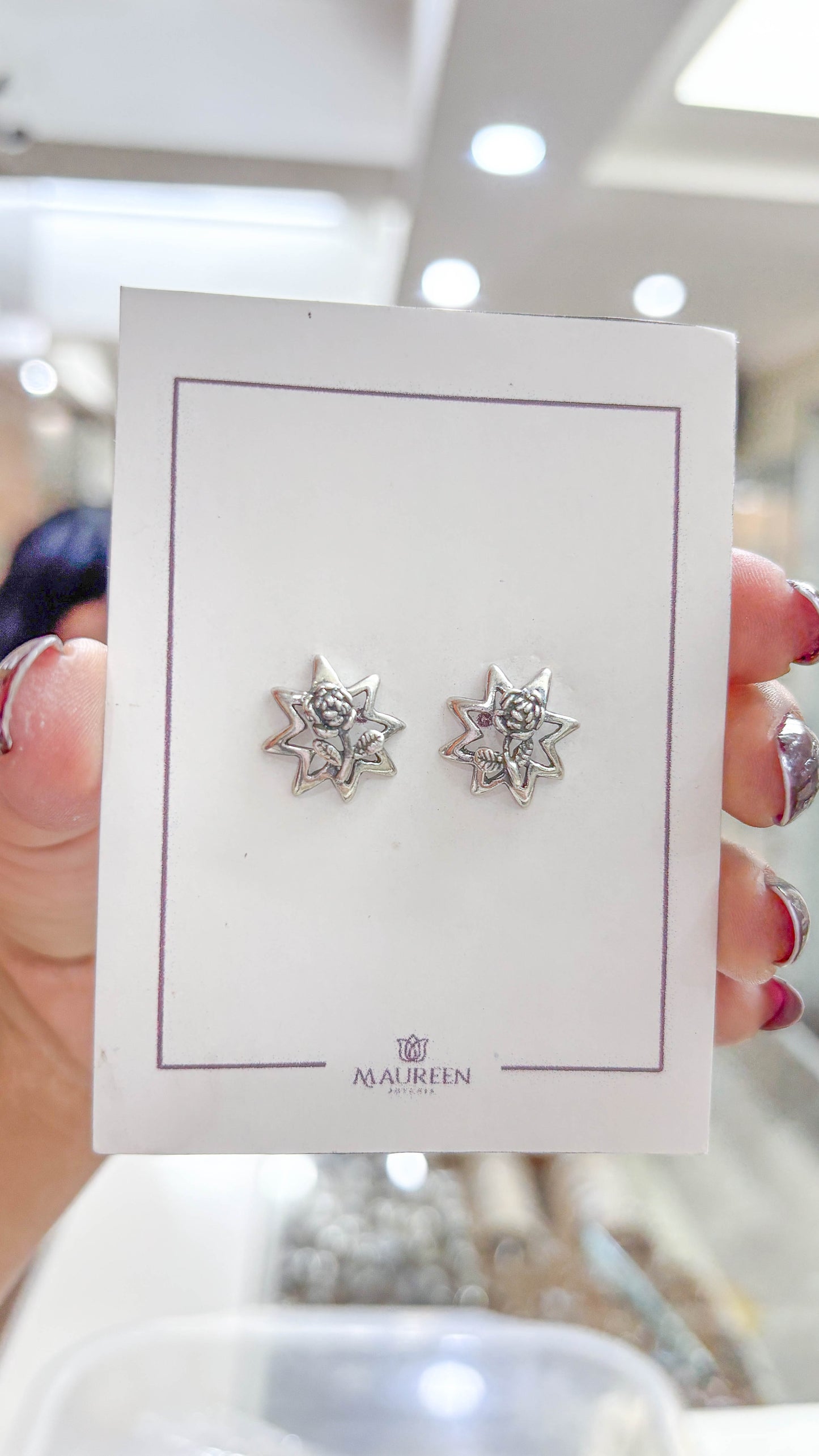 Arete estrella y rosa - Plata quemada