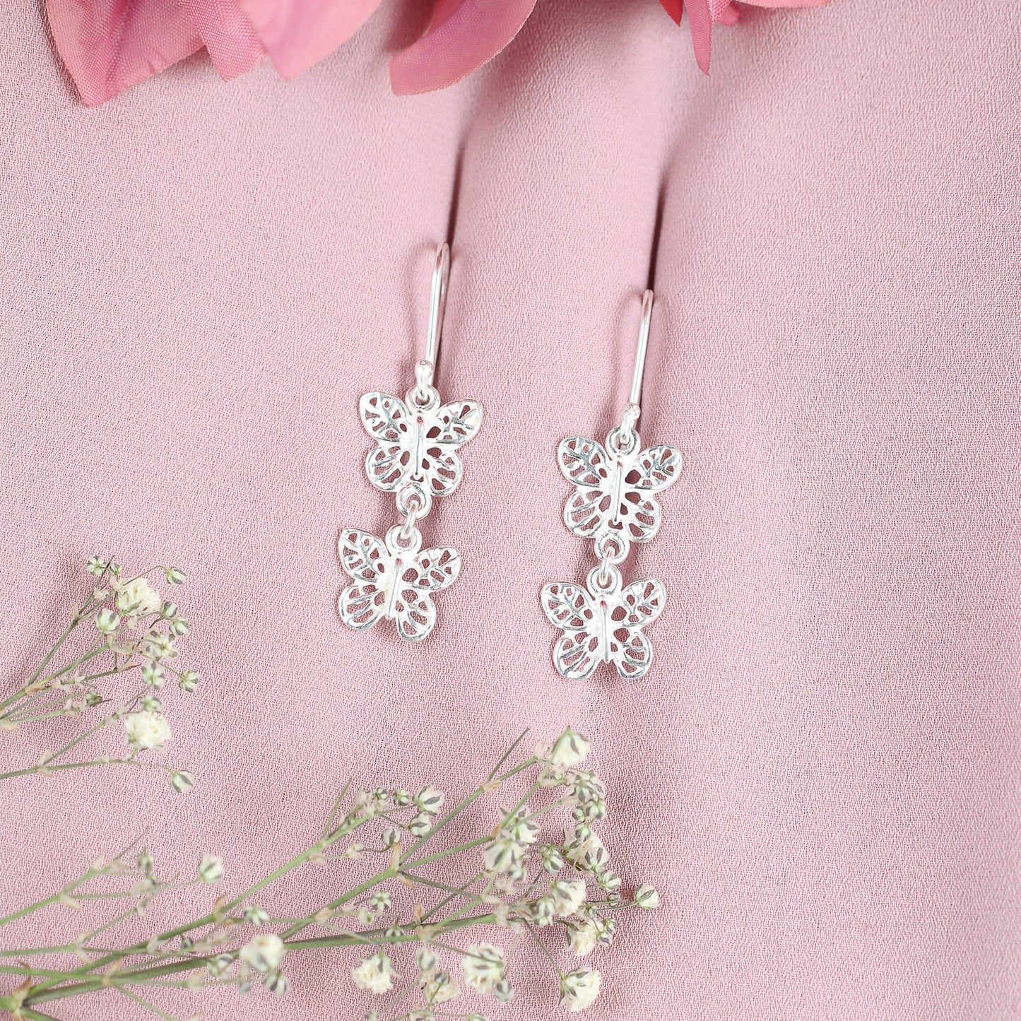 Arete dos mariposas tejidas - Plata