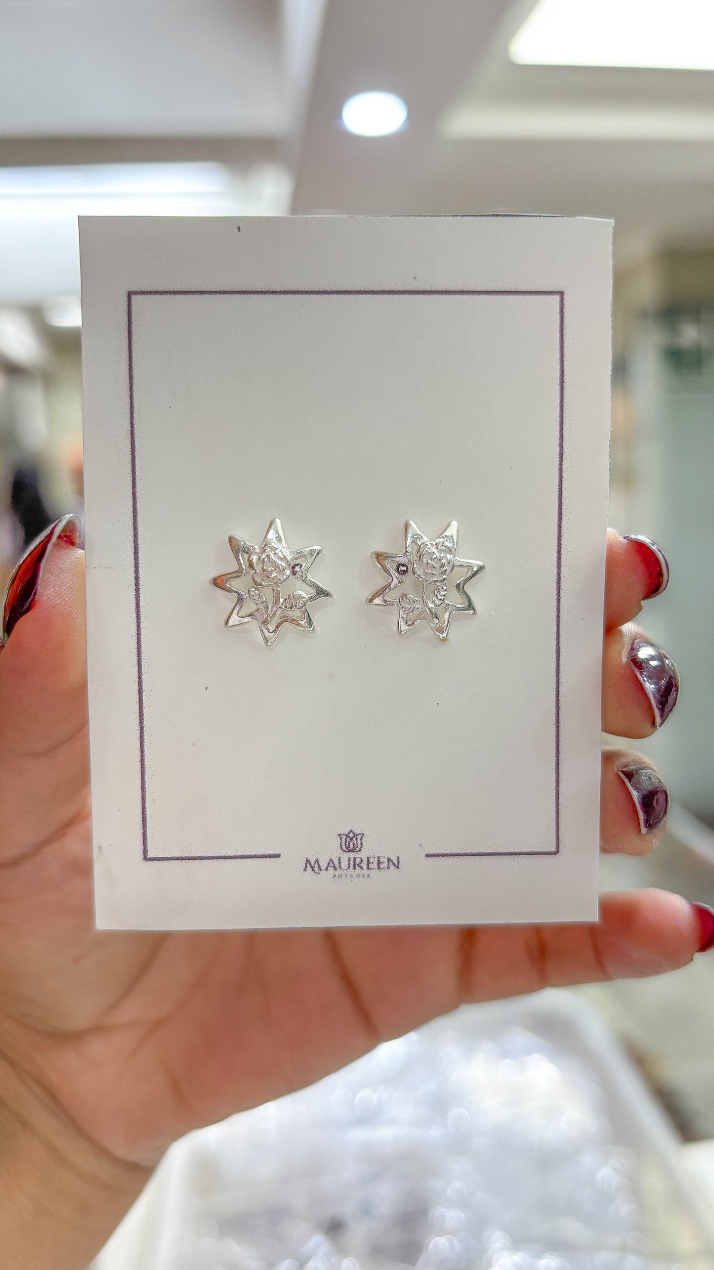 Arete estrella varias puntas con rosa pegado - Plata