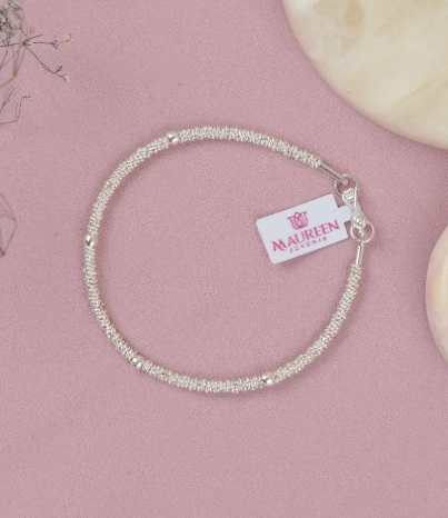Pulsera donas entorchadas con 4 chaquiras - Plata