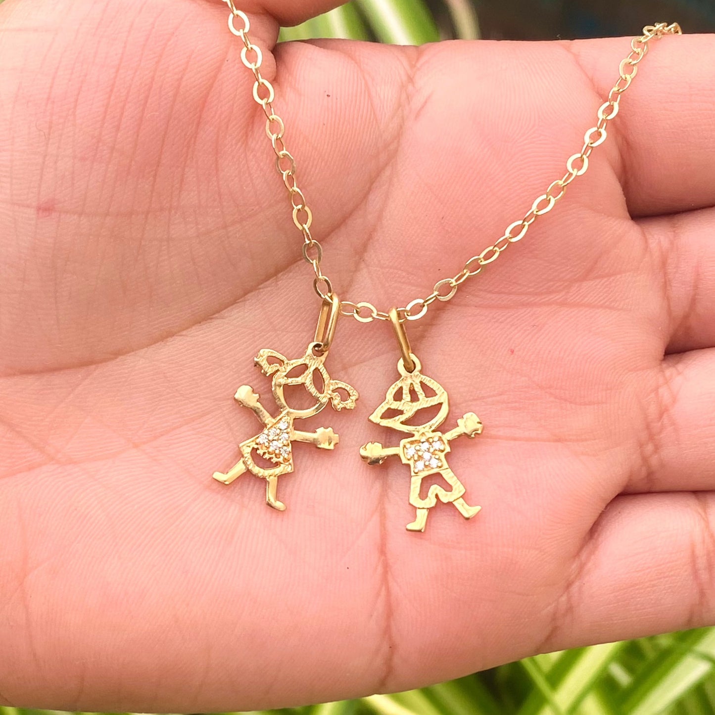 Dije de niño y niña - Oro