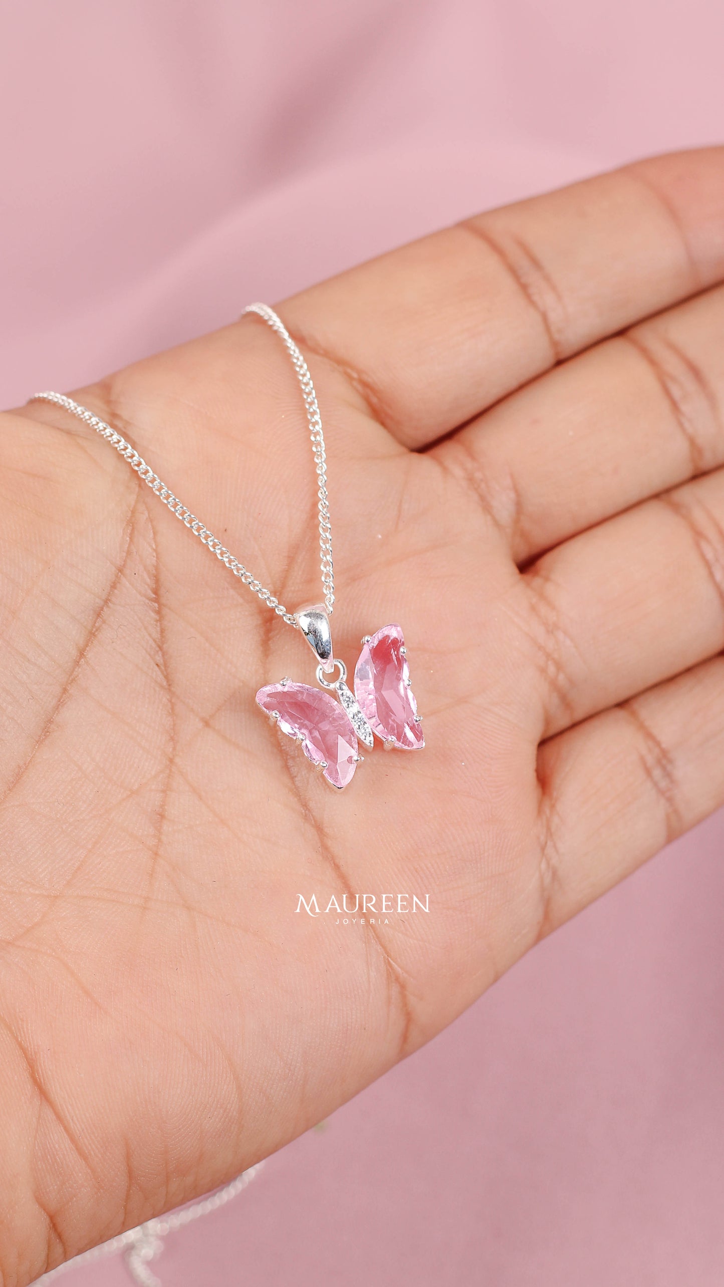 Dije mariposa rosada