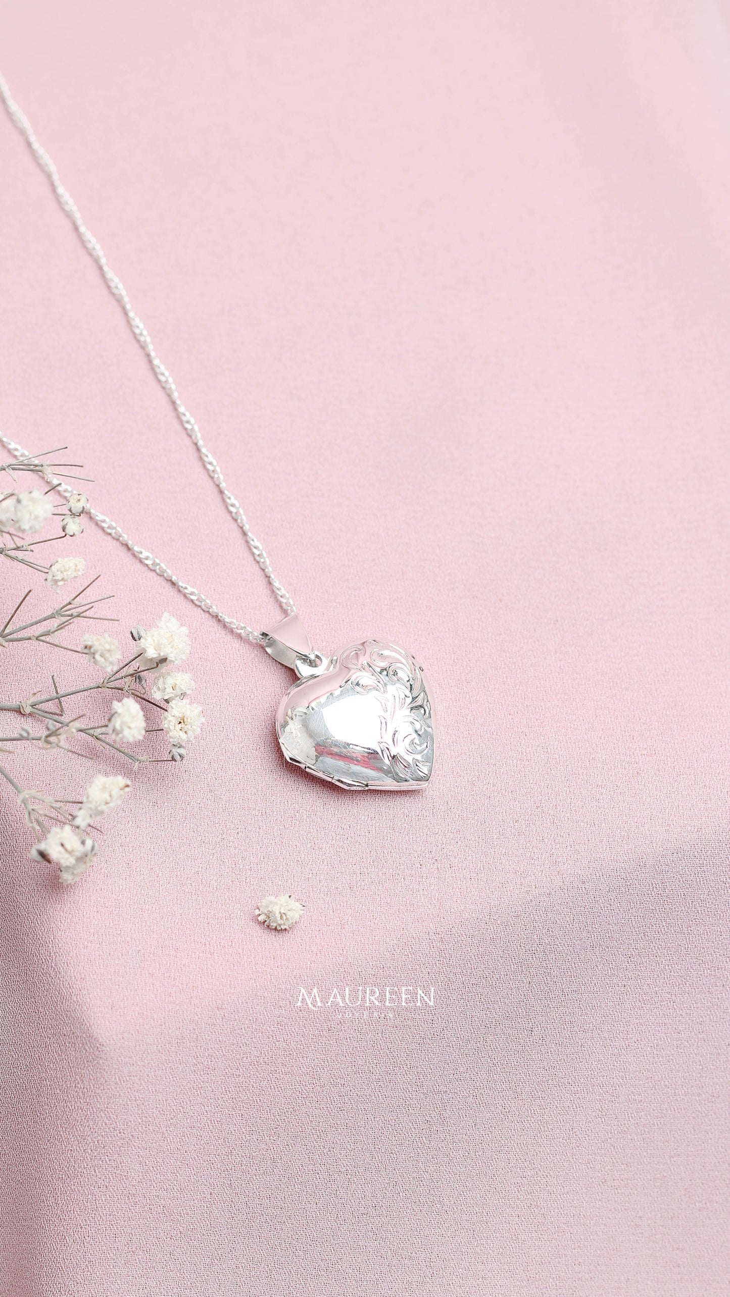 Dije relicario corazón con hojas - plata