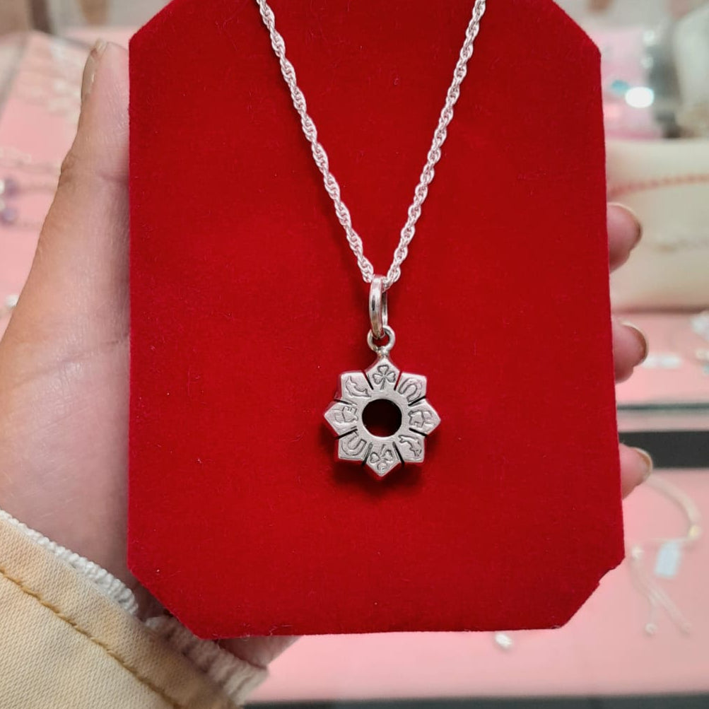 Dije sol encajonado - Plata quemada