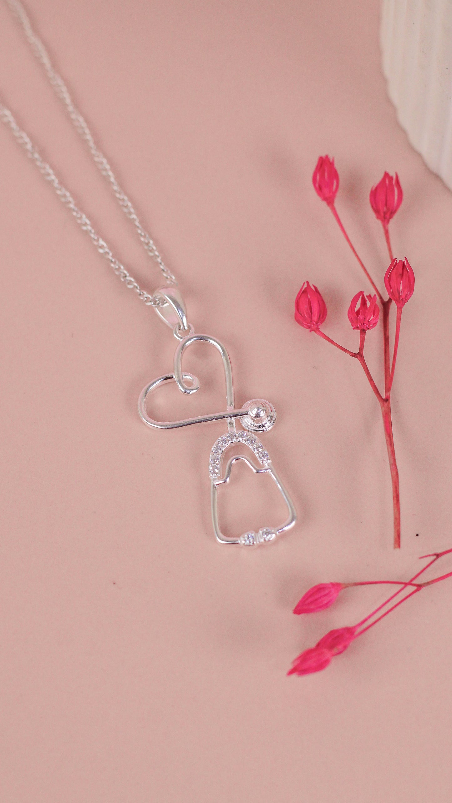 Dije corazón con etetoscopio - Plata