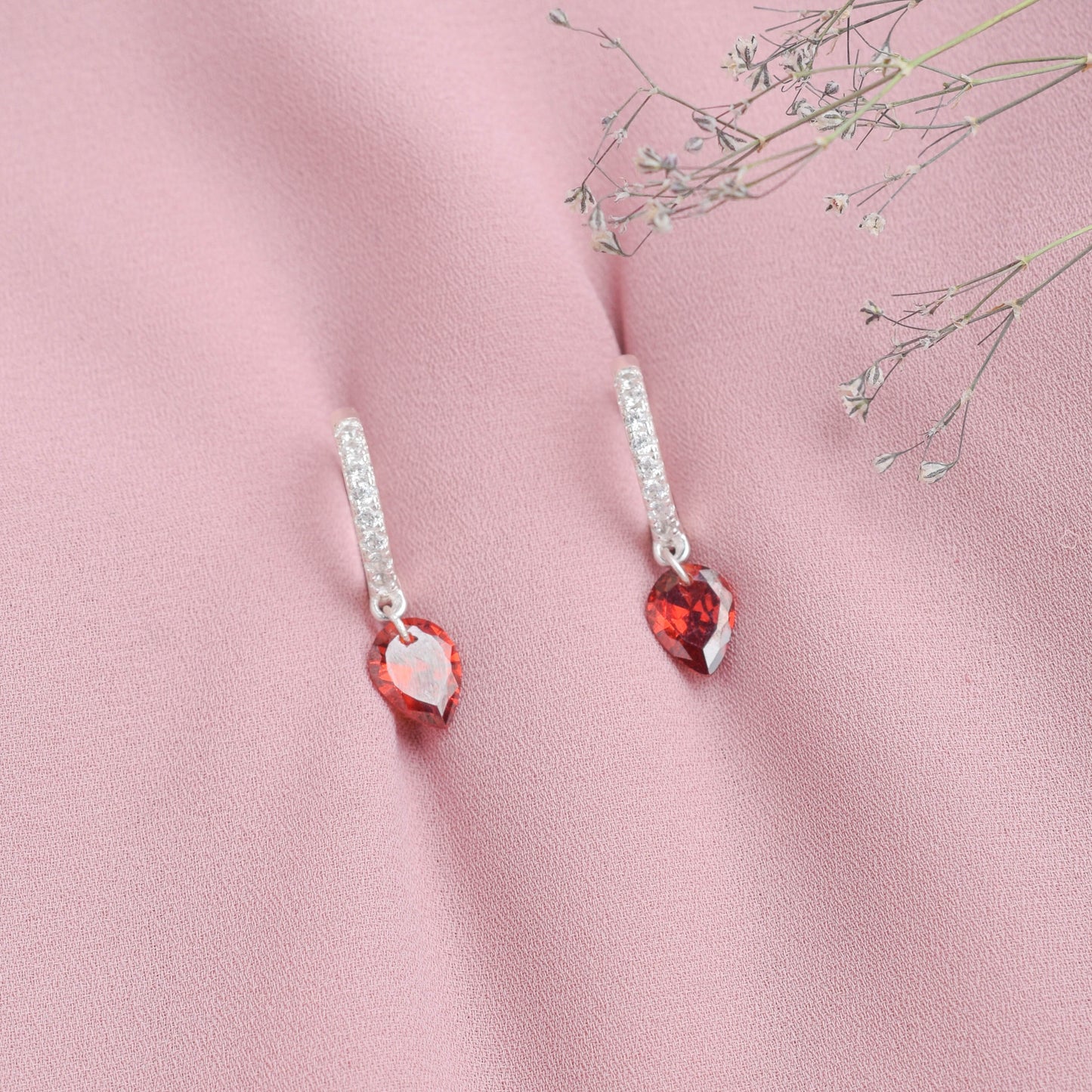 Argolla huggies gota rubi - Plata