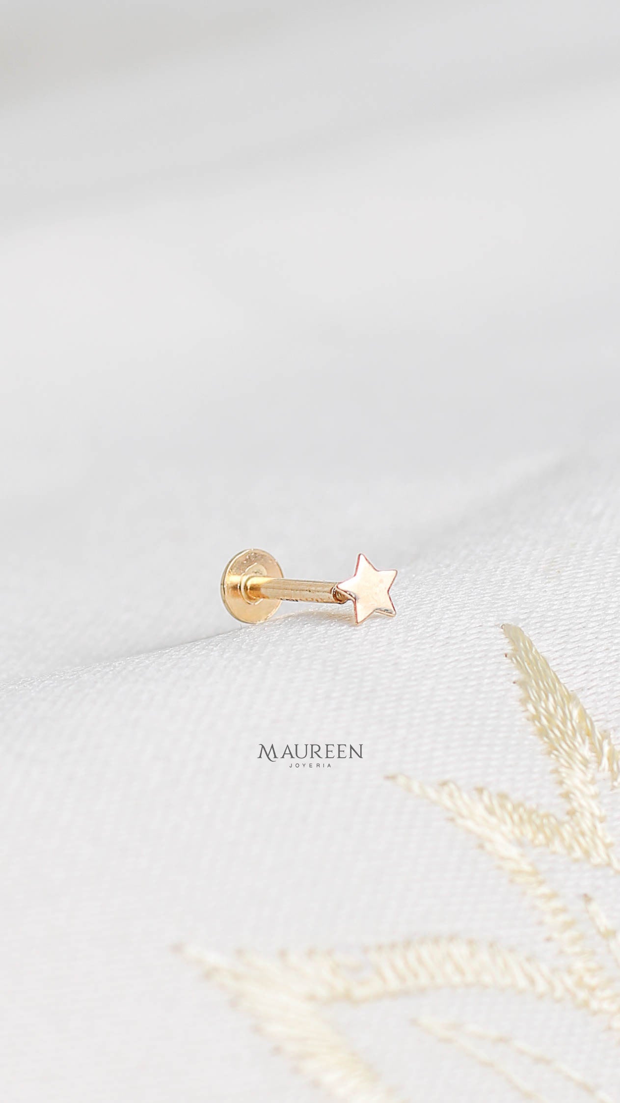 Arete piercing estrella- Oro