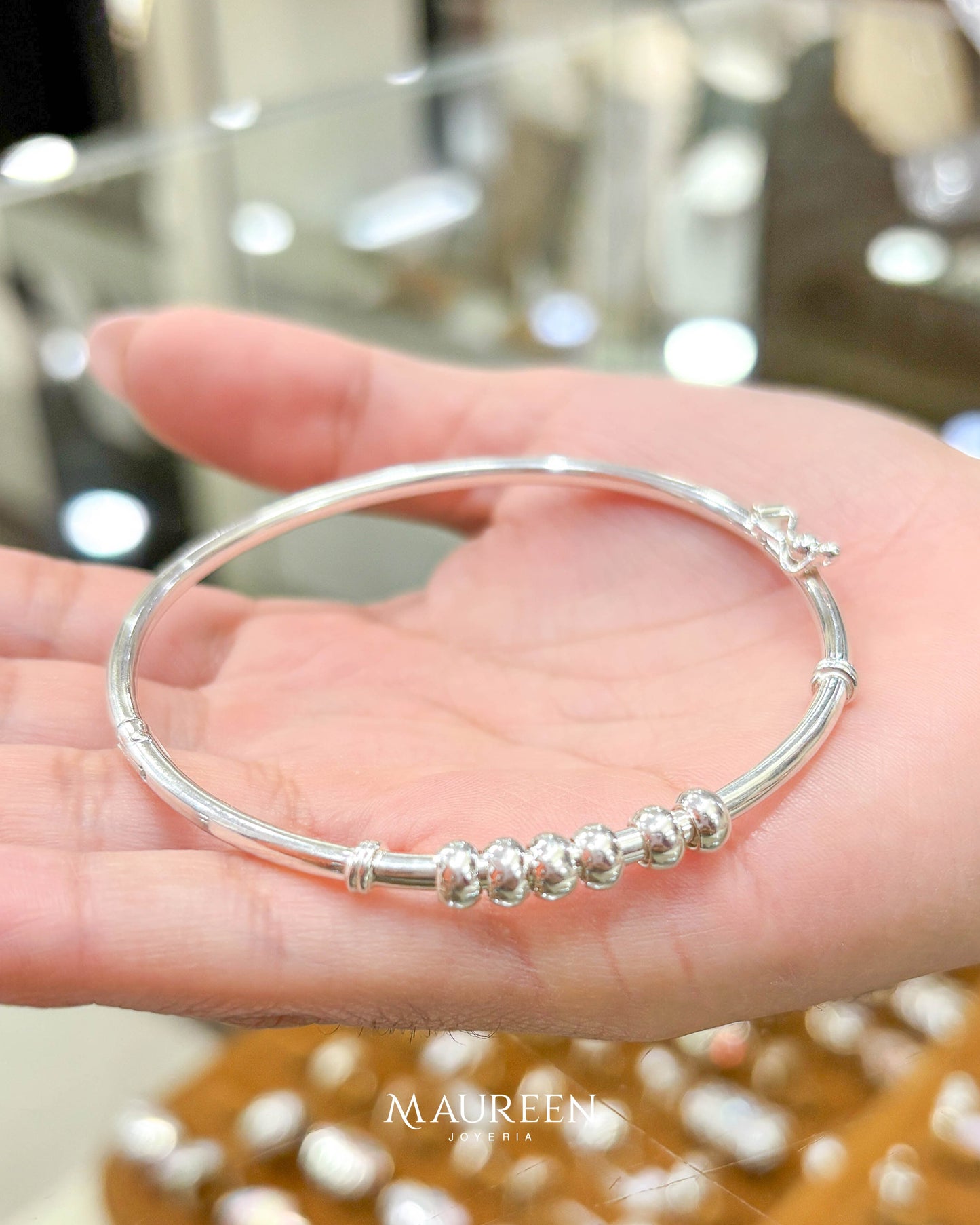 Puñera con 6 donas a un costado - Plata