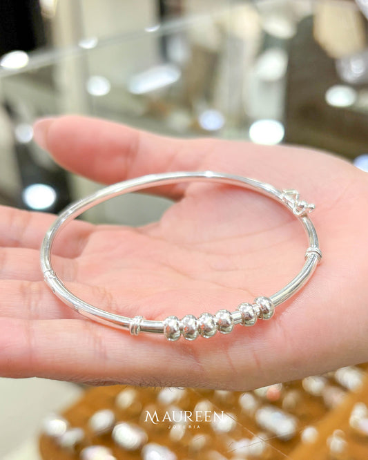 Puñera con 6 donas a un costado - Plata