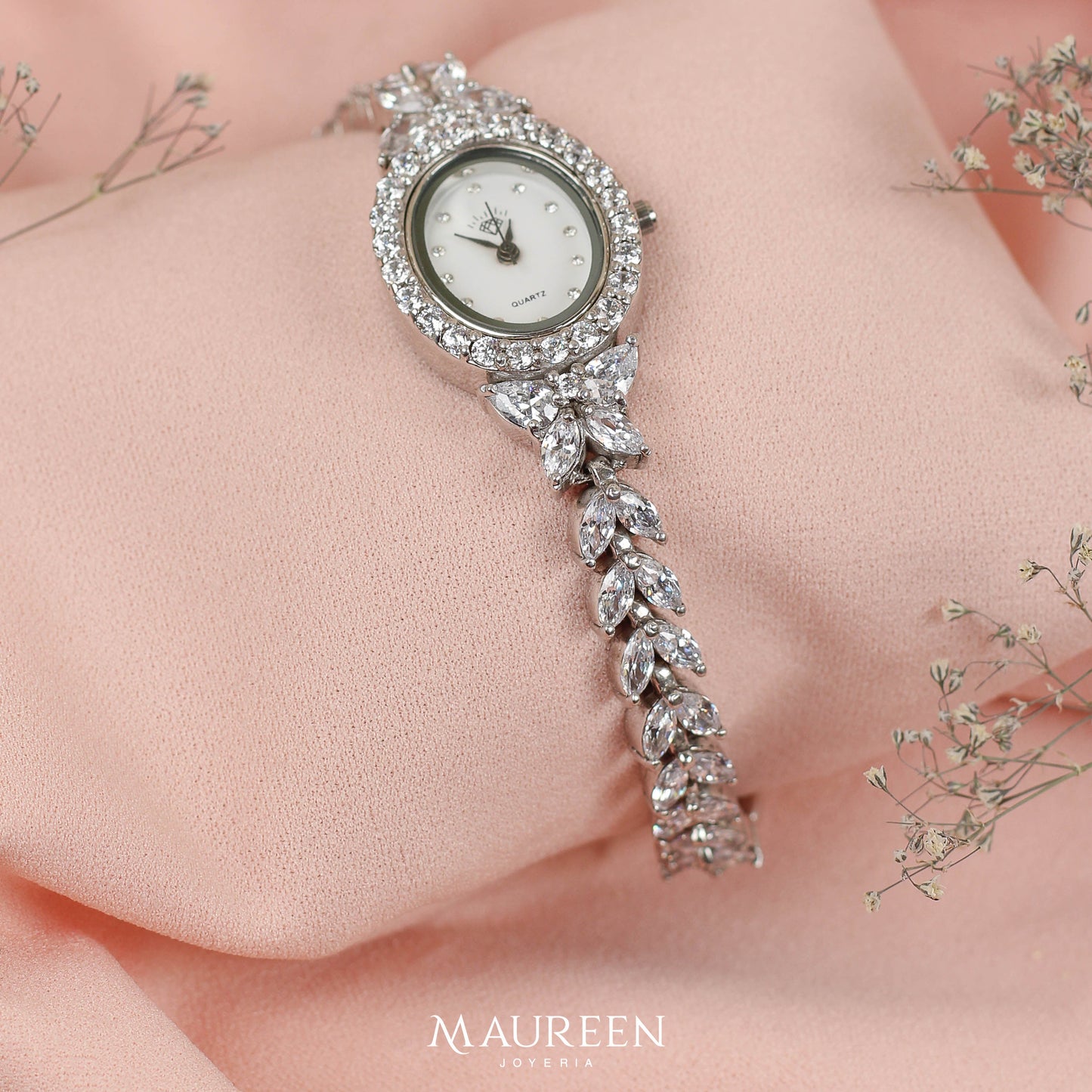 Reloj ovalado con circones- Plata