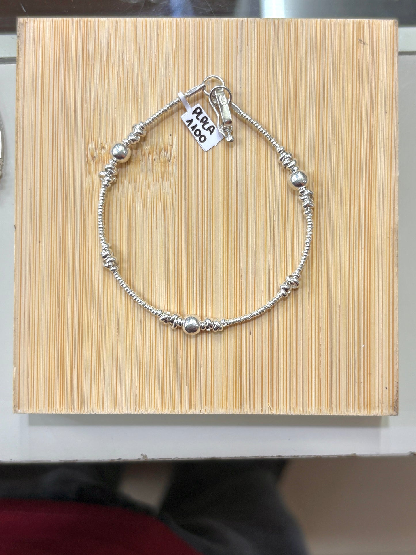 Pulsera shakira con nudos - plata