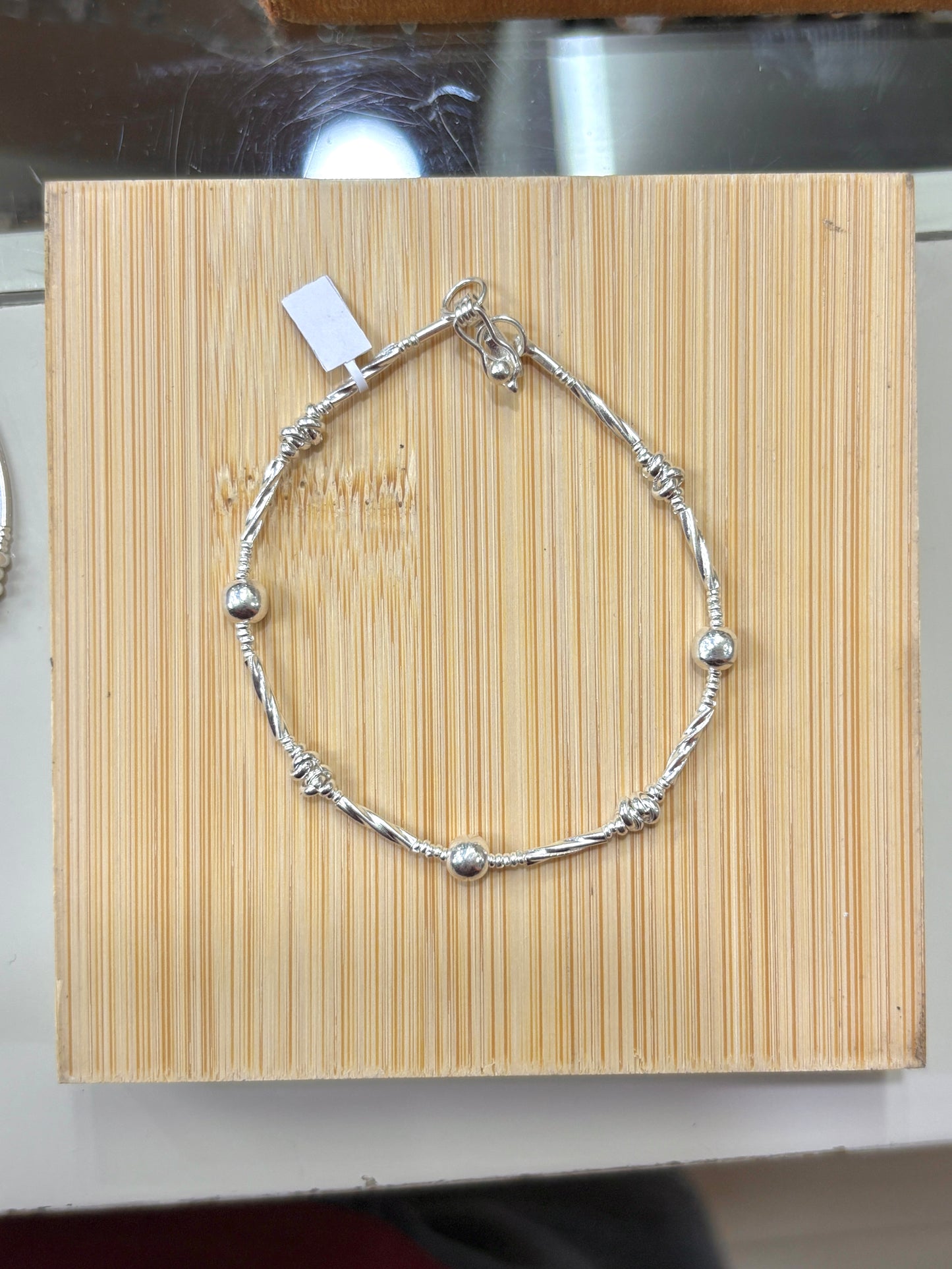 Pulsera shakira tubos entorchados - plata