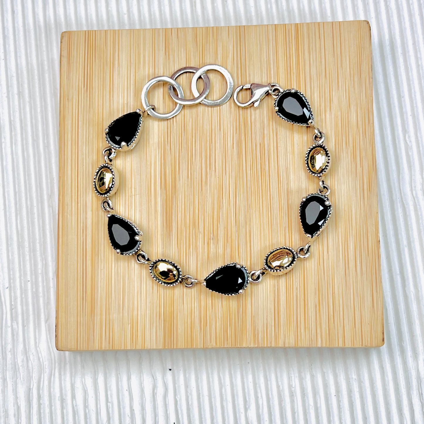 Pulsera gota onix - plata con oro