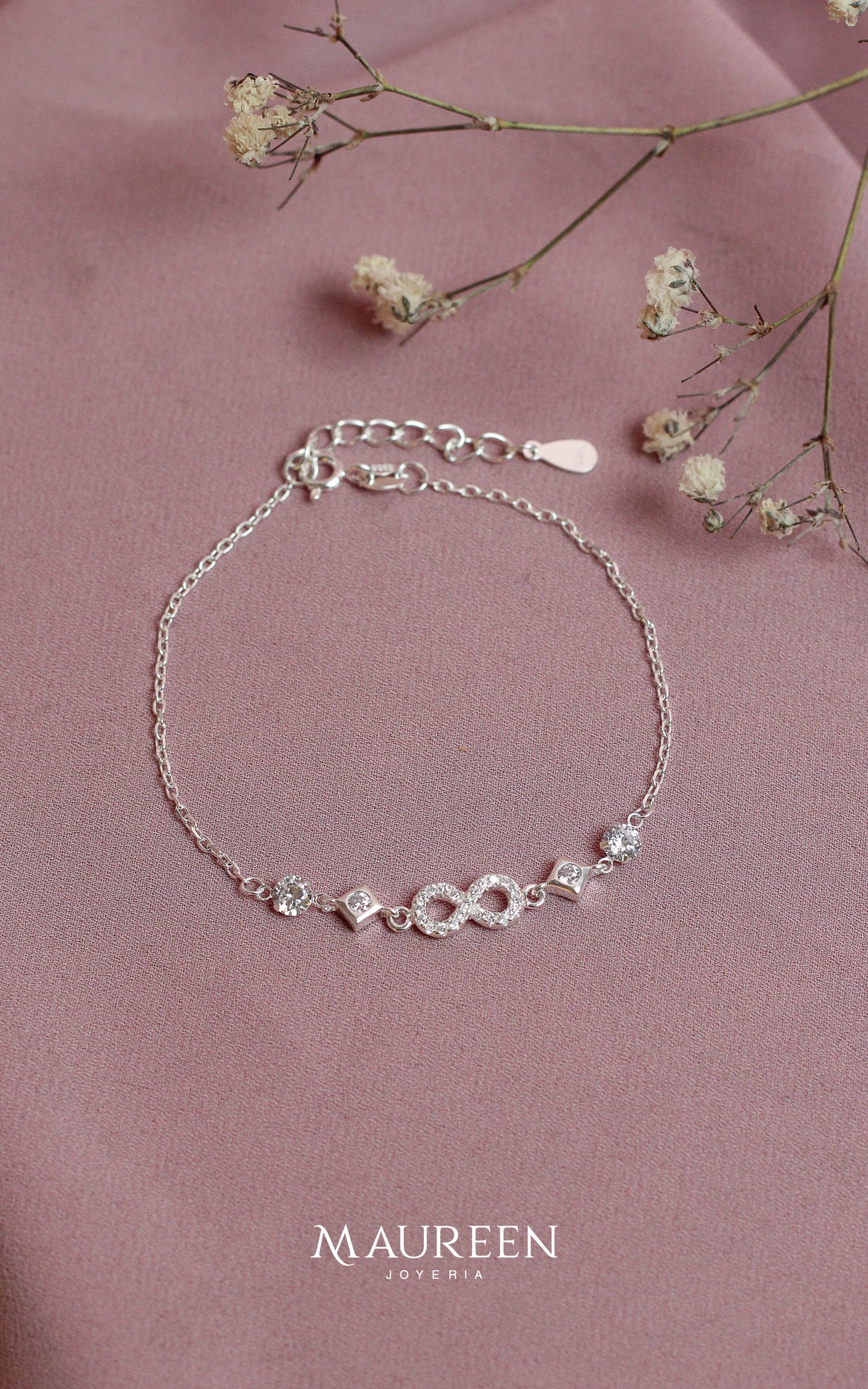 Pulsera infinitos romos punto luz - Plata