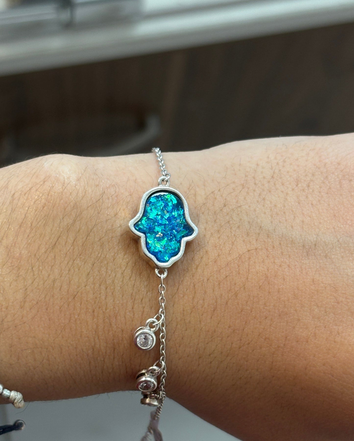 Pulsera mano podersa piedra de fuego - Plata