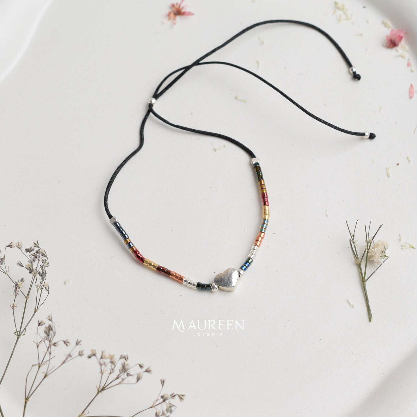 Pulsera miyuki hilo negro corazón - Plata