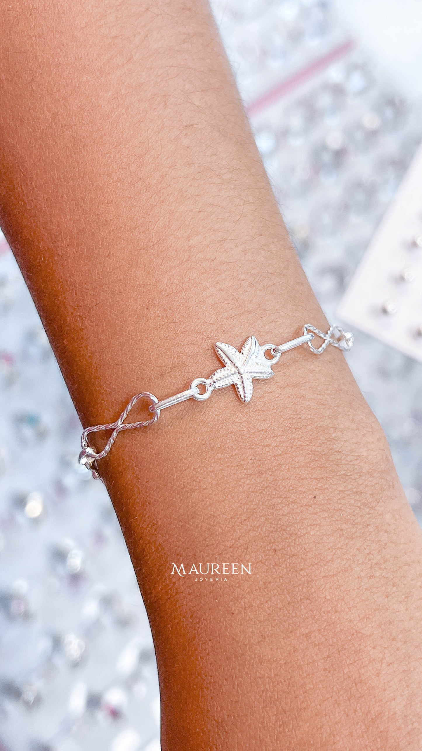 Pulsera estrella de mar con infinito- plata