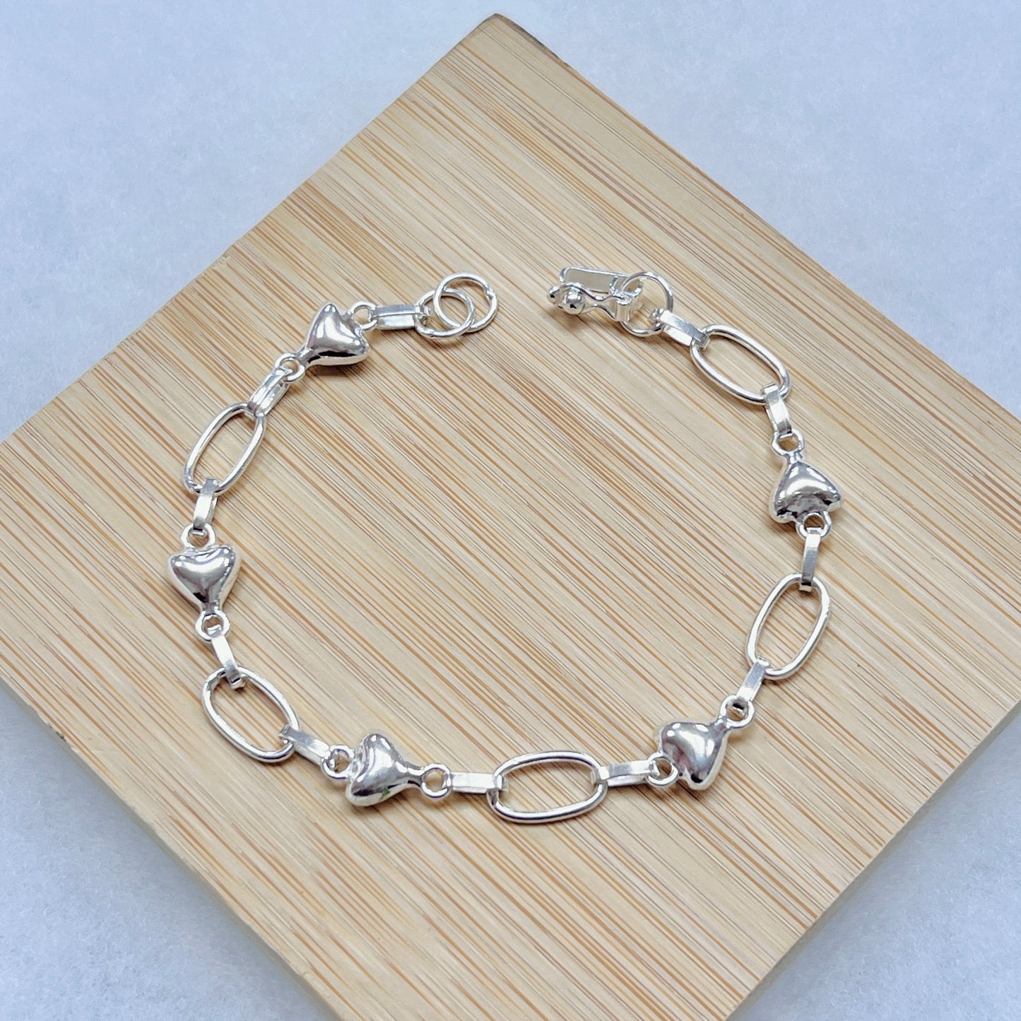 Pulsera corazones bombachos y eslabones - plata