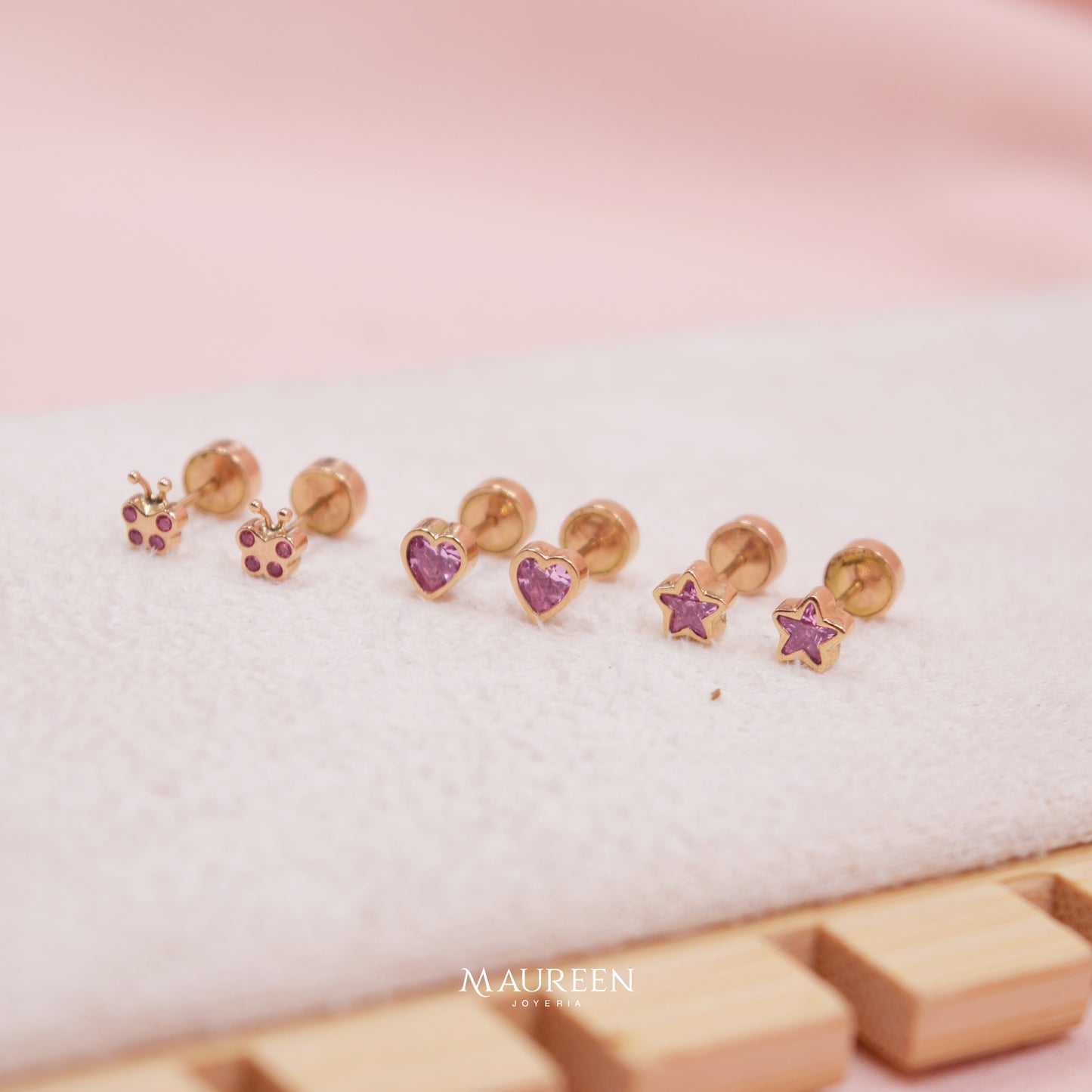 Arete abridor piedra rosada- Oro