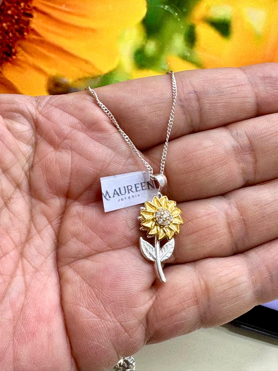 Dije girasol antiestres - Plata/ Oro