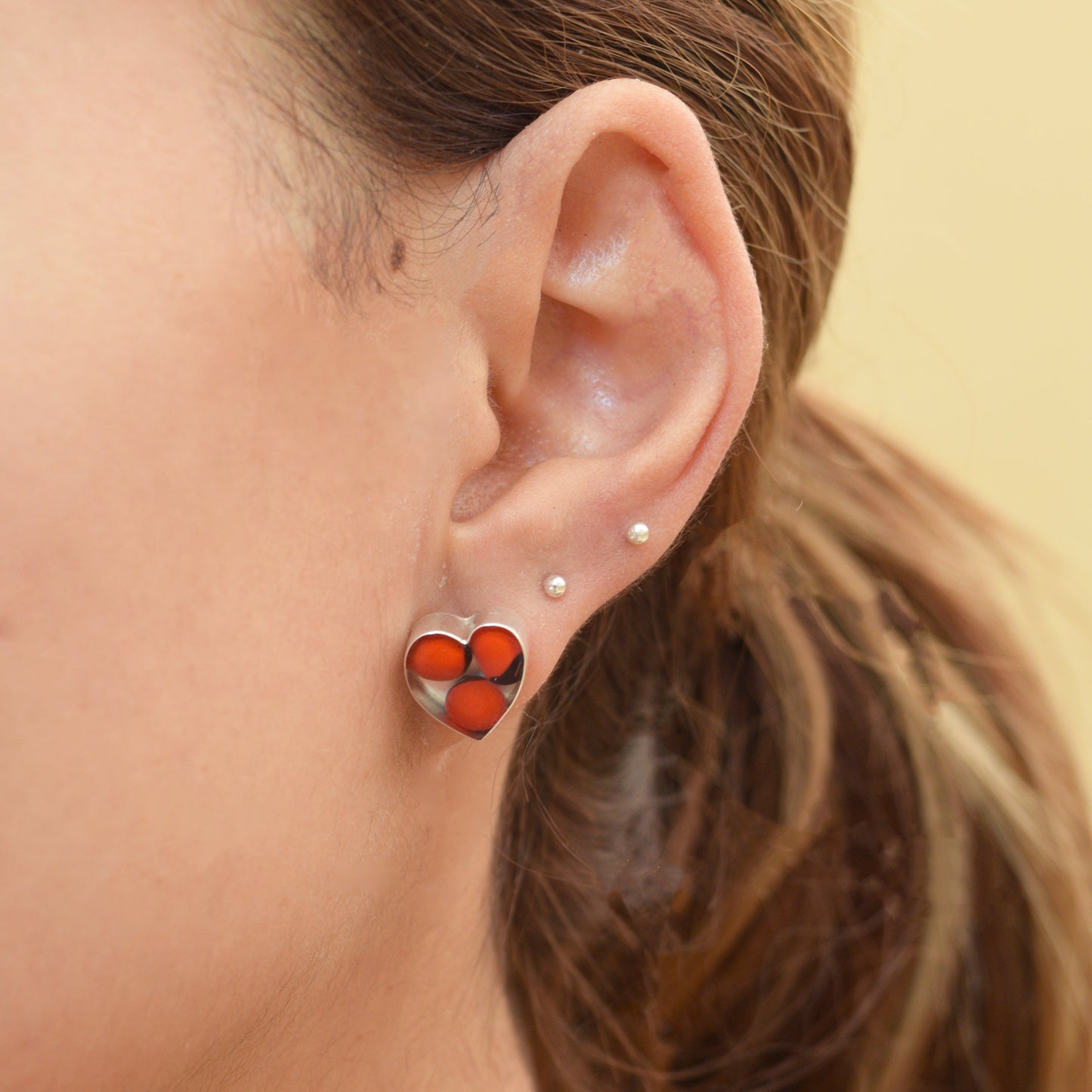 Aretes corazon huayruro - Plata