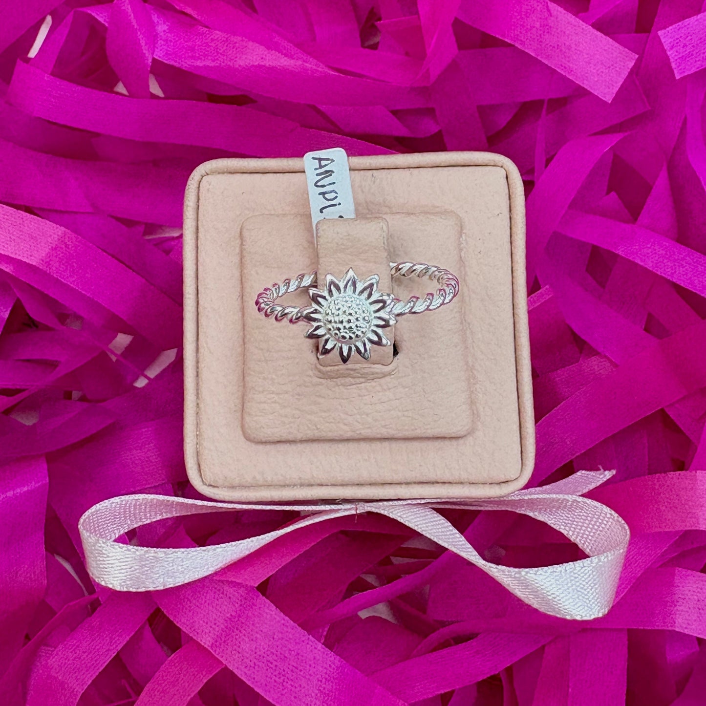 Anillo enroscado con mini girasol - plata