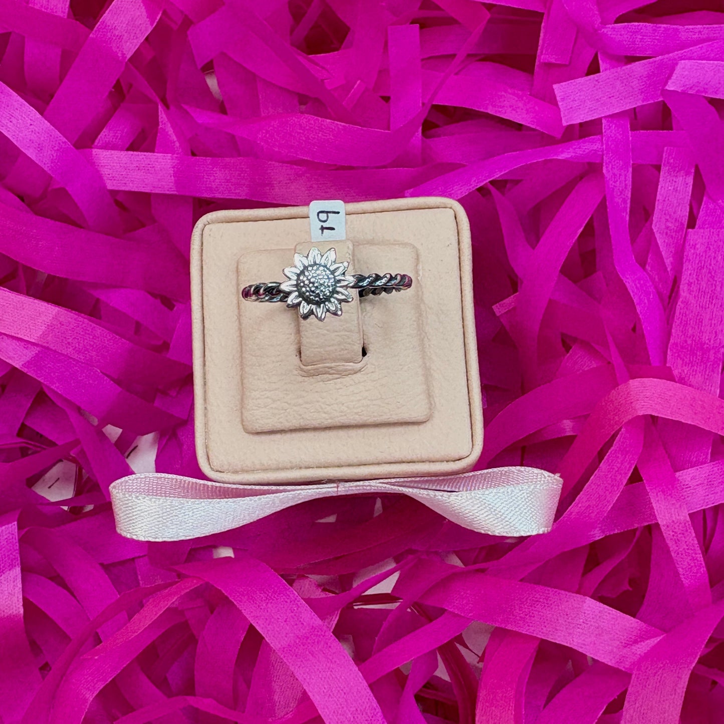 Anillo enroscado con mini girasol - plata