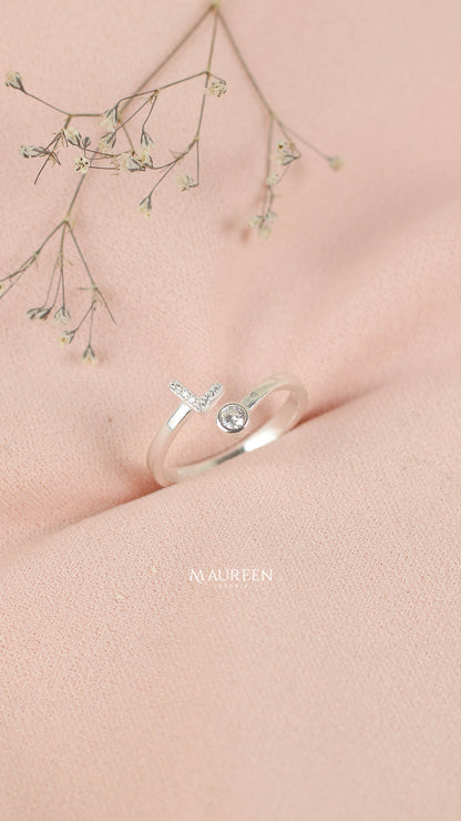 Anillo ajustable letras con punto de luz - Plata