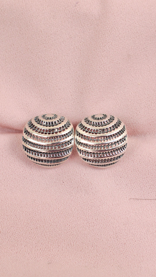 Arete oval tejido pegado - Plata quemada