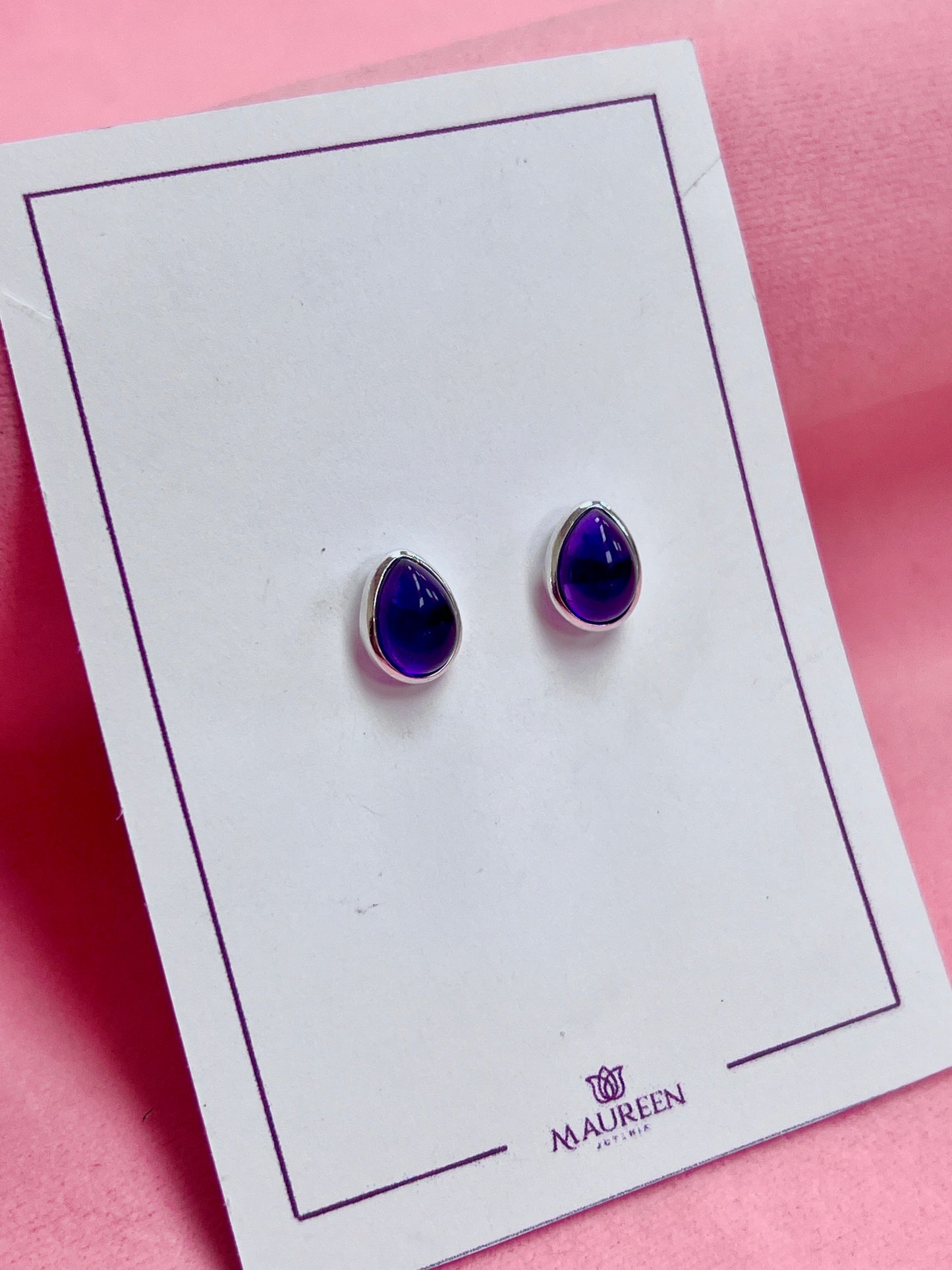 Arete gota piedra amatista pegado