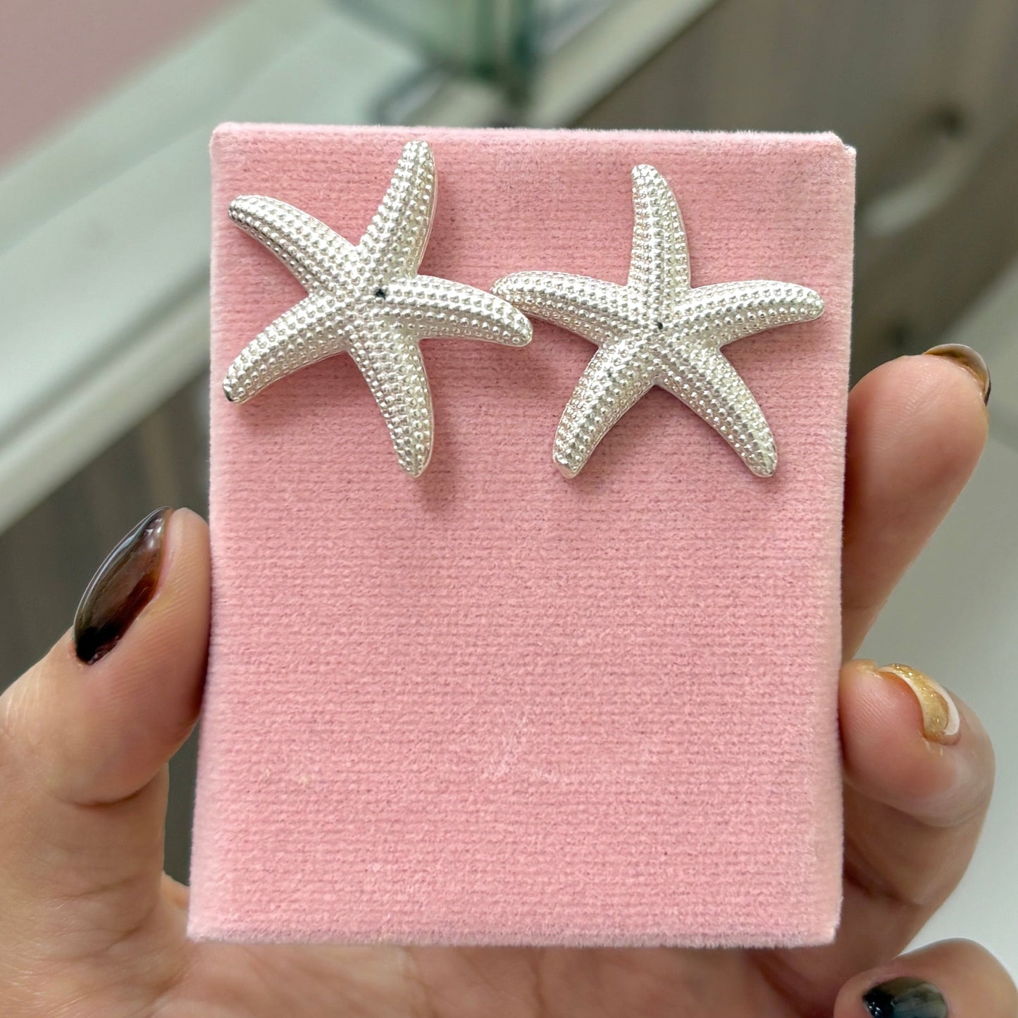 Arete estrella de mar con puntos pegado - plata