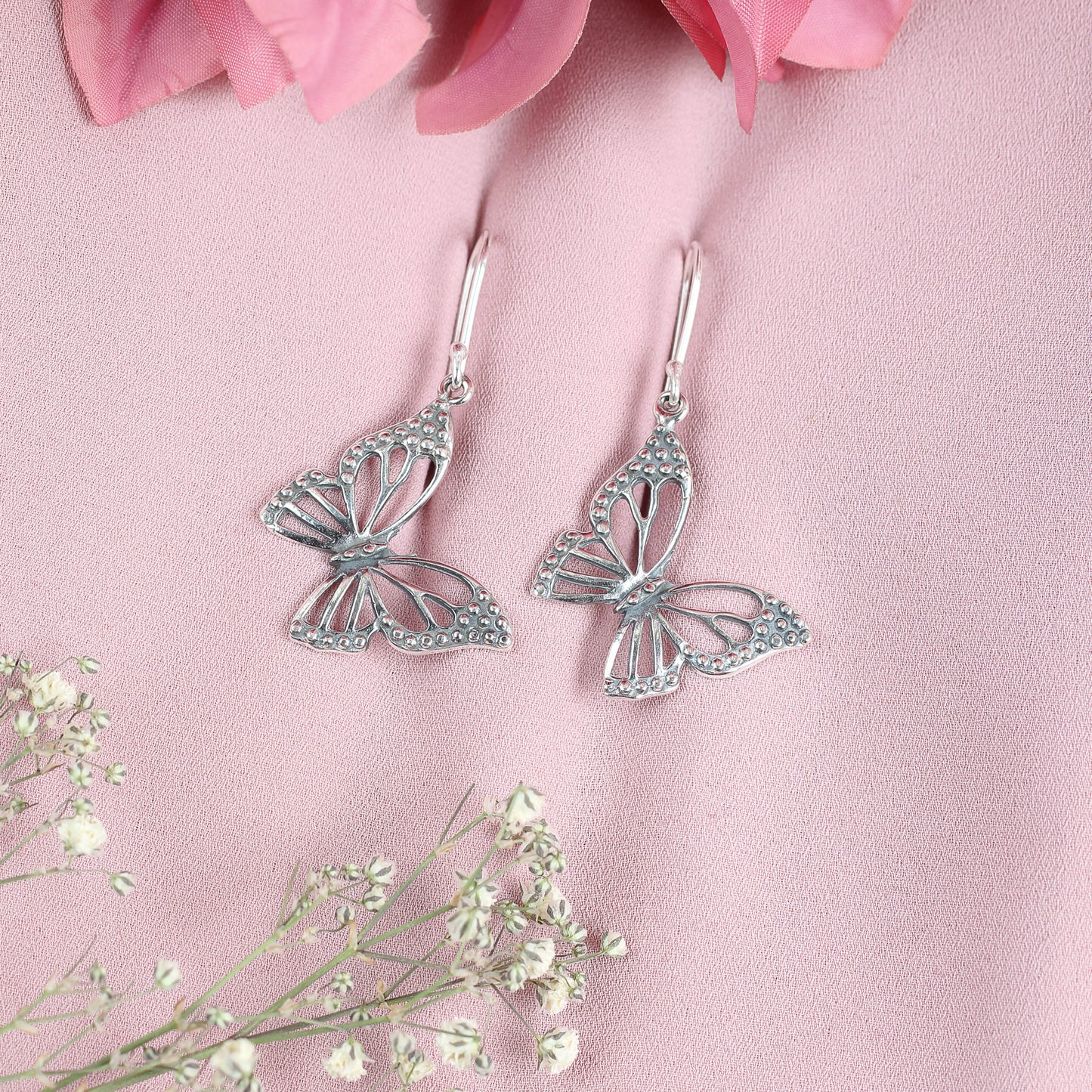 Arete mariposa con puntos en las alas plata quemada - Plata