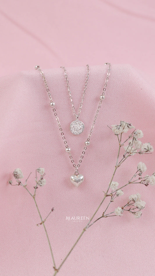Collar doble corazon y punto de luz  - Plata
