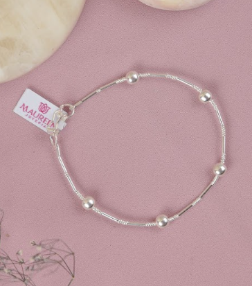 Pulsera tubo chaquira y 5 bolas intercalado - Plata