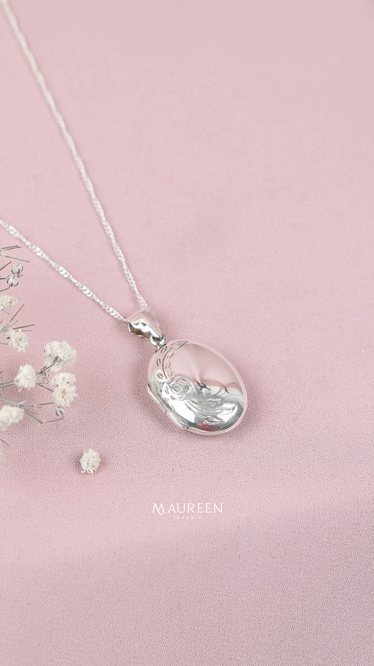 Dije relicario ovalado con rosa y hojas - plata