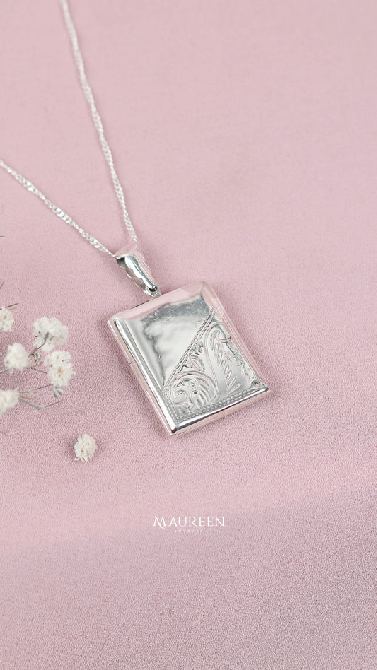 Dije relicario rectangular hojas a la mitad   - plata
