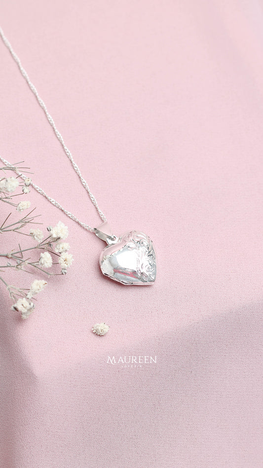 Dije relicario corazón con hojas - plata