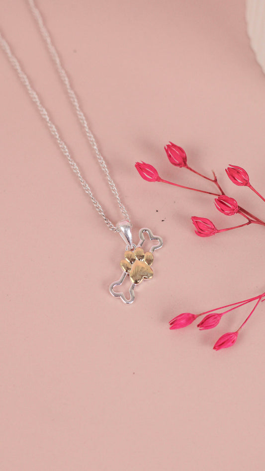 Dije hueso calado con huella -  Plata/Oro