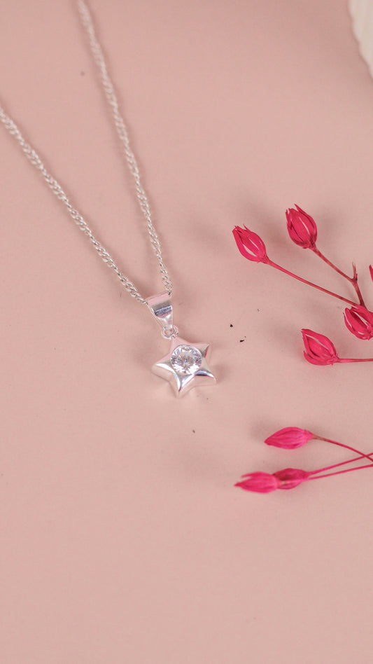 Dije estrella con circon -  Plata