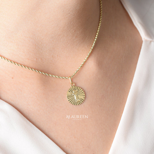 Dije Divino Niño diamantado circular - Oro