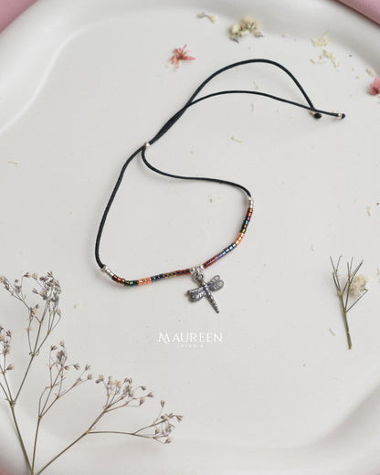 Pulsera miyuki hilo negro dije libélula - Plata