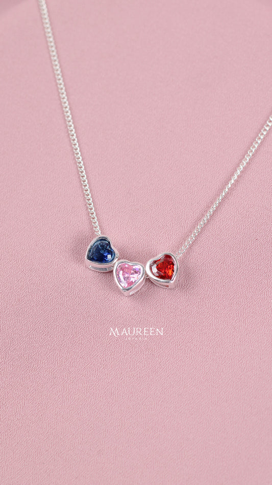 Dije pasante corazon circon rojo, rosado, azul - Plata