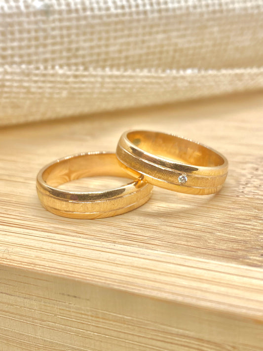 Aros de matrimonio media caña con circon - Oro