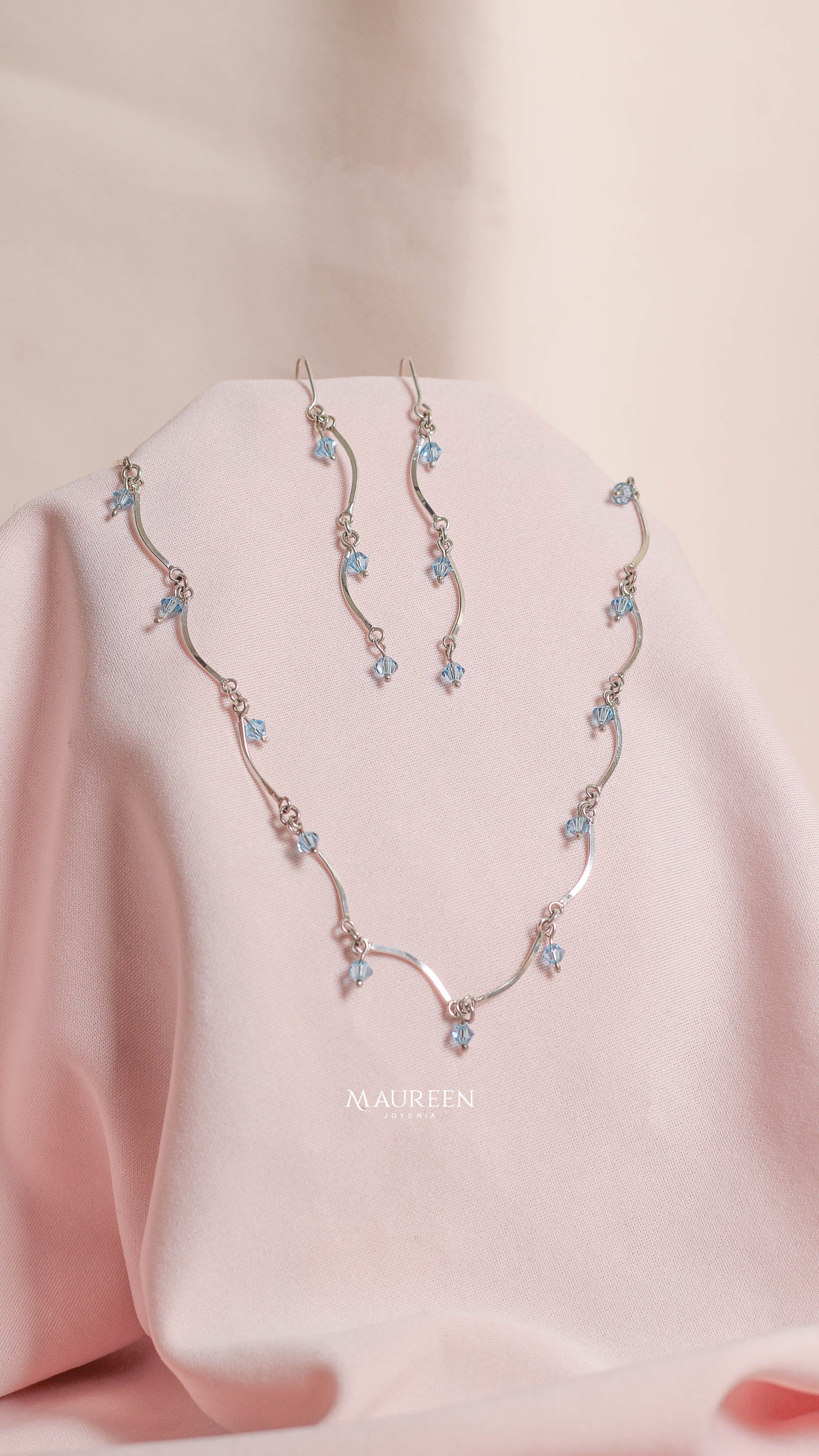 Juego ondeado circon celeste colgante  - Plata