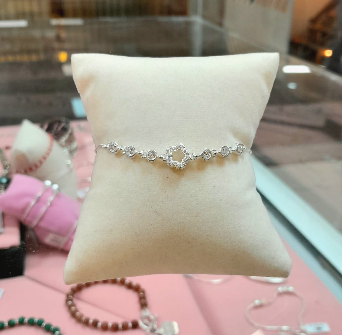 Pulsera flor y puntos luz  -  Plata