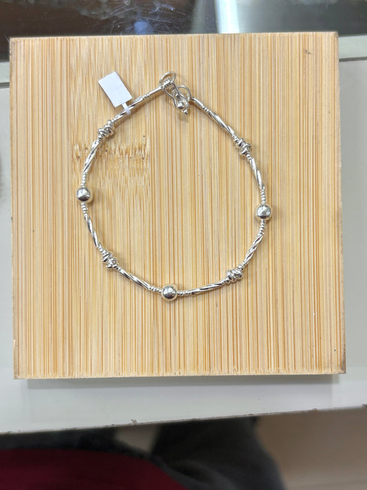 Pulsera shakira tubos con nudos - plata